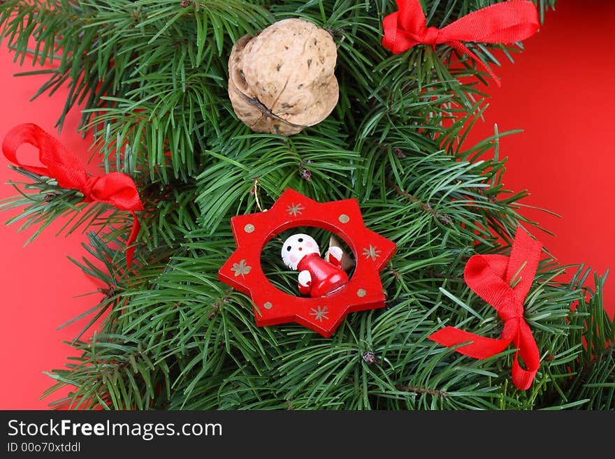 Christmas decoration- red andel, walnut, ribbon