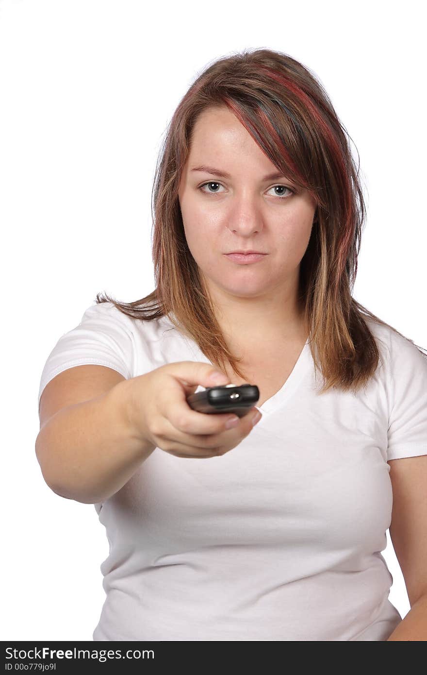 Young woman trying to change channels with remote. Young woman trying to change channels with remote