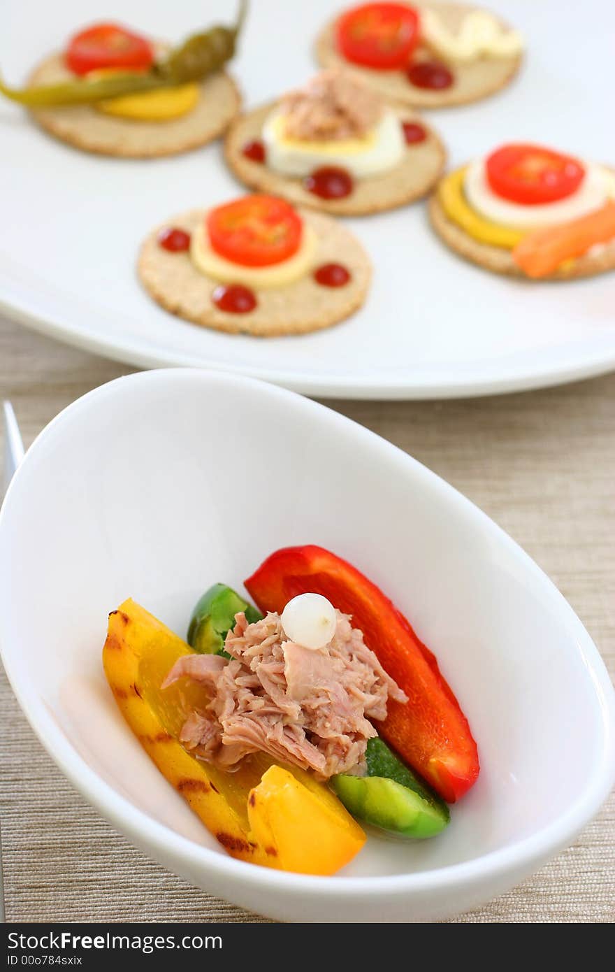 Healthy colorful platter with assorted vegetables on fancy white china. Healthy colorful platter with assorted vegetables on fancy white china