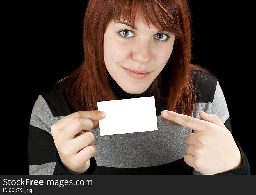 Girl pointing finger at a blank business card, smiling and cute.

Studio shot. Girl pointing finger at a blank business card, smiling and cute.

Studio shot.