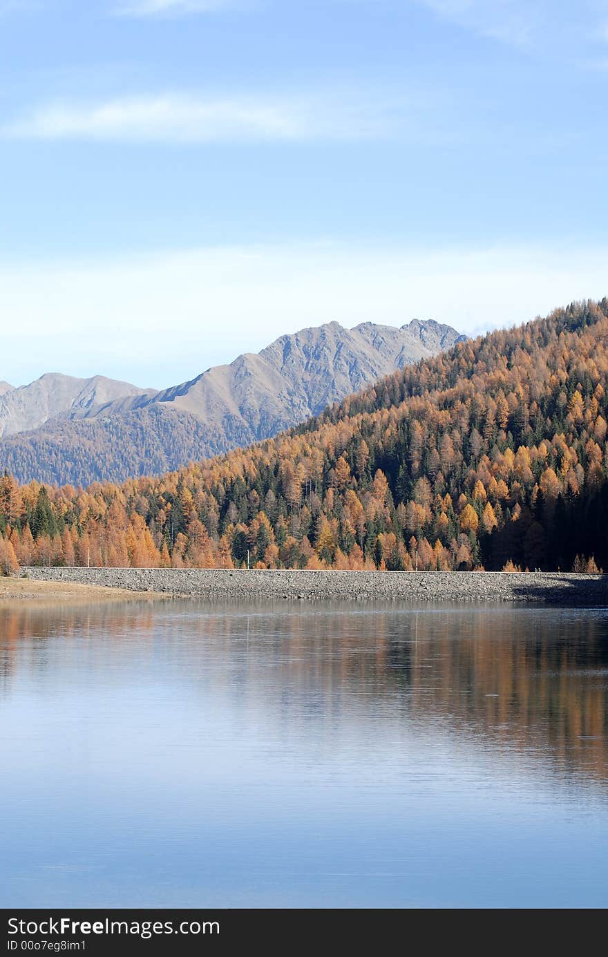 Limpid and calm lake in high mountain. Limpid and calm lake in high mountain.