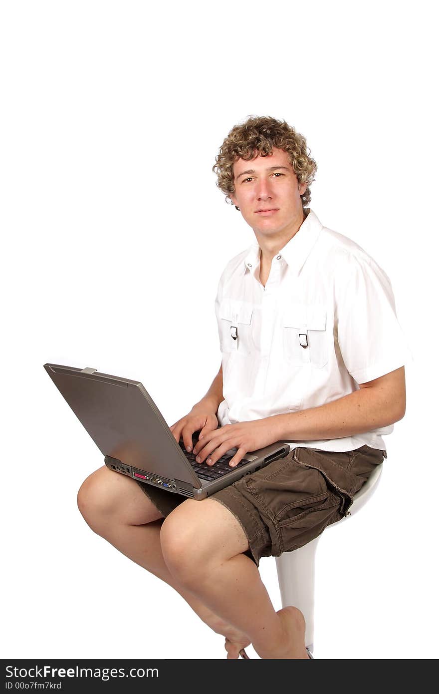 Yuppie working in casual clothes on laptop. Yuppie working in casual clothes on laptop