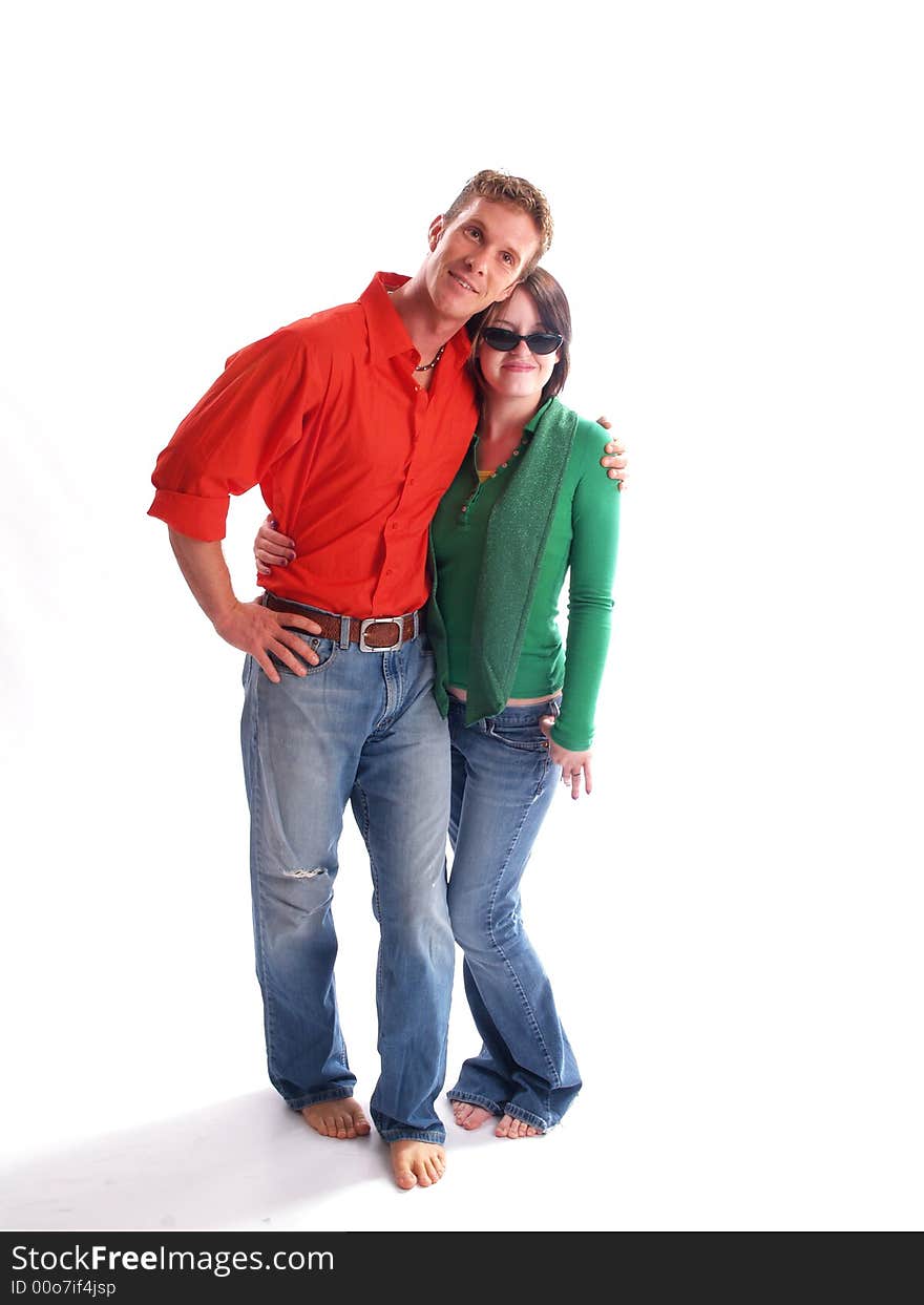 Young adult couple wearing red and green. Young adult couple wearing red and green