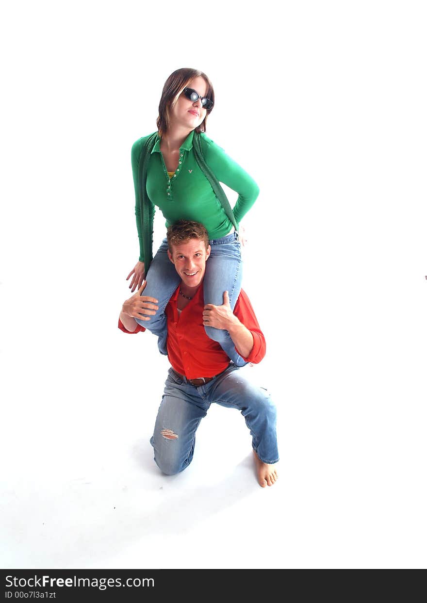 Young adult couple wearing red and green. Young adult couple wearing red and green