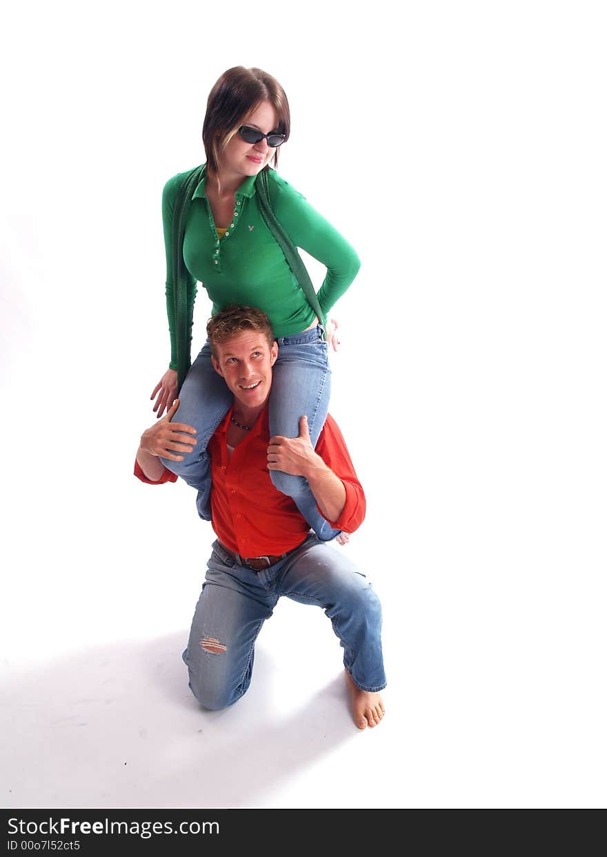 Young adult couple wearing red and green. Young adult couple wearing red and green