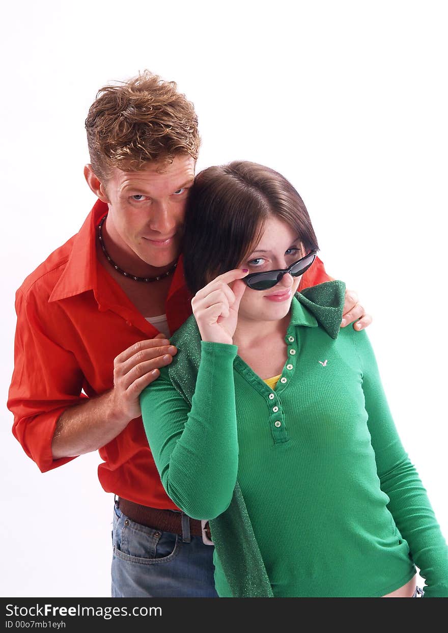 Young adult couple wearing red and green. Young adult couple wearing red and green