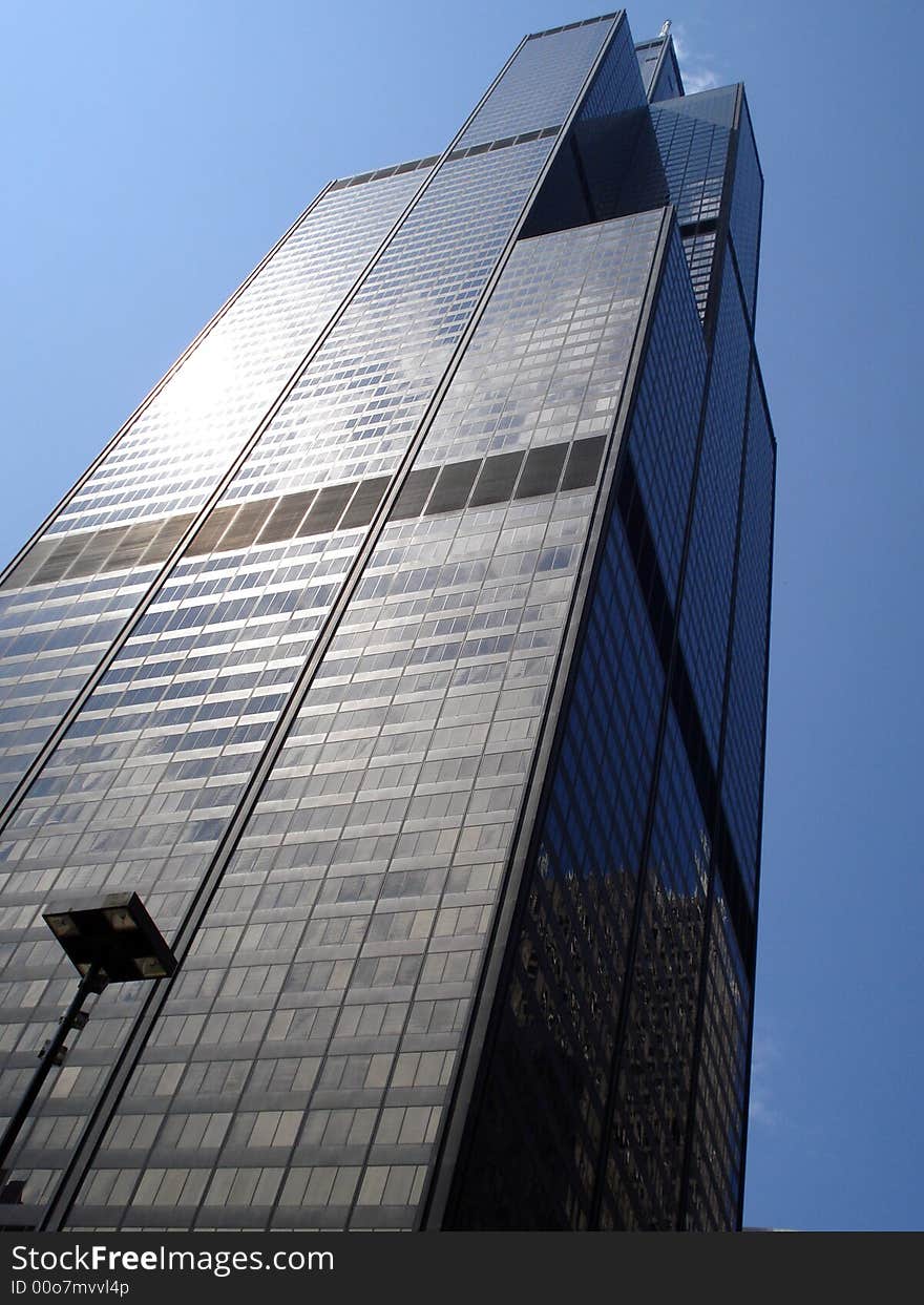 A skyscrapper in Chicago towers over the city. A skyscrapper in Chicago towers over the city.