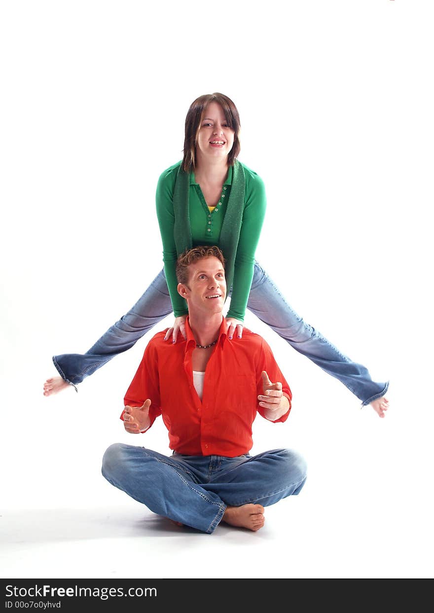 Young adult couple wearing red and green. Young adult couple wearing red and green