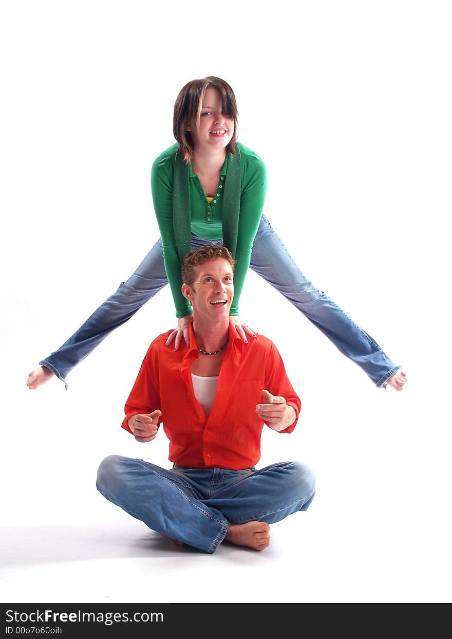 Young adult couple wearing red and green. Young adult couple wearing red and green