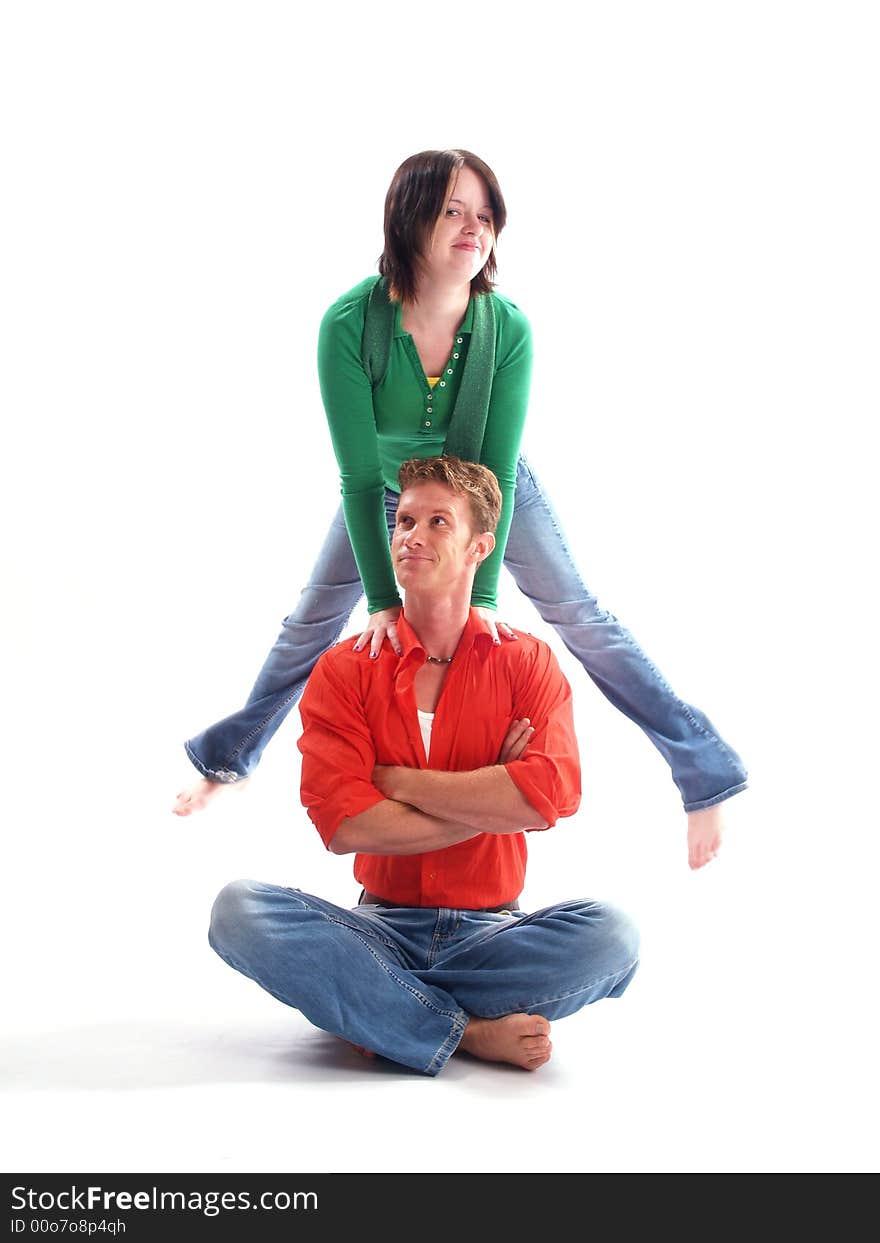 Young adult couple wearing red and green. Young adult couple wearing red and green