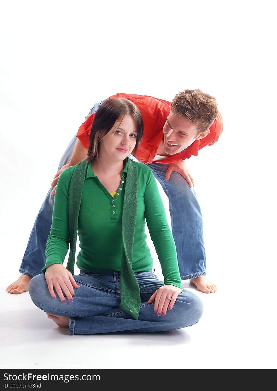 Young adult couple wearing red and green. Young adult couple wearing red and green