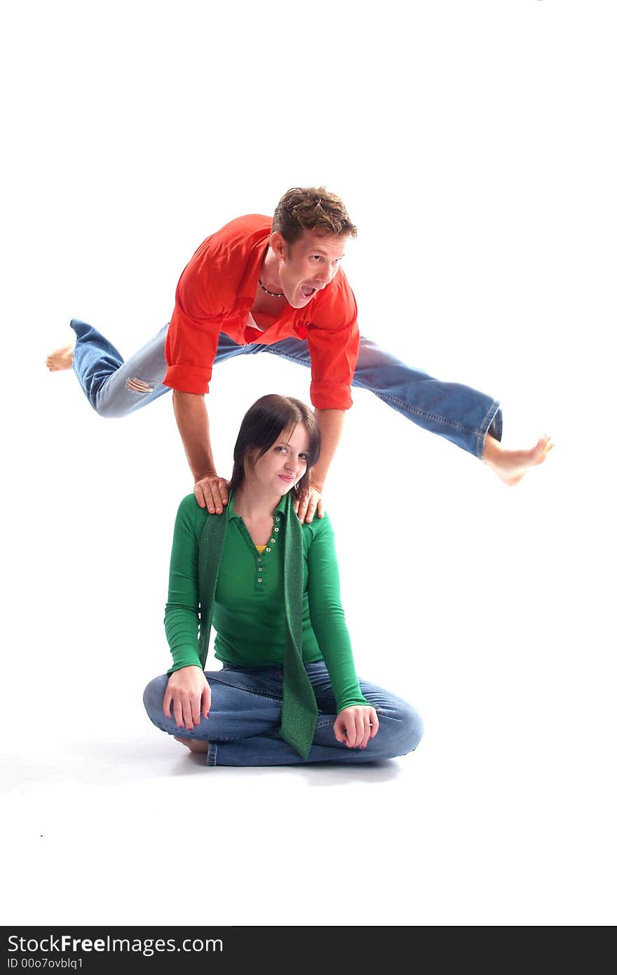 Young adult couple wearing red and green. Young adult couple wearing red and green