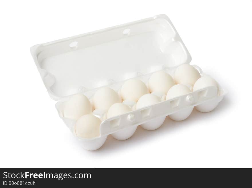 Eggs on egg lifting tray, on white background