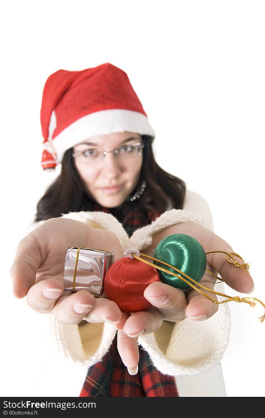 Girl with red hat holding some gifts. Girl with red hat holding some gifts