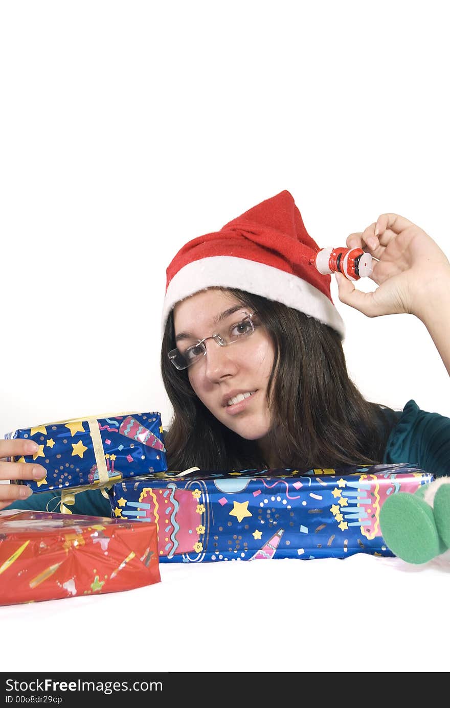 Girl with red hat and a lot of gifts. Girl with red hat and a lot of gifts