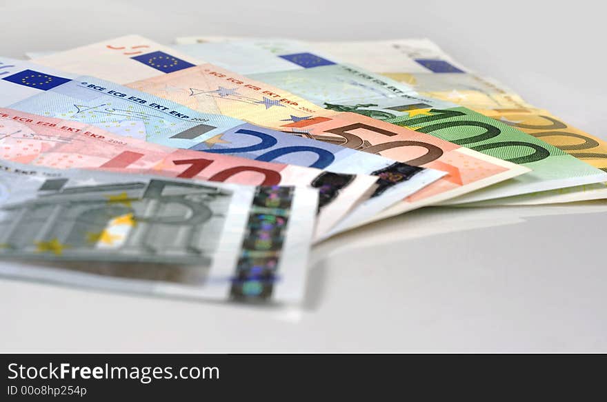 Simple shot of Euro banknotes of 200, 100, 50, 20, 10 Euros spread on a white table.

Studio shot. Simple shot of Euro banknotes of 200, 100, 50, 20, 10 Euros spread on a white table.

Studio shot.