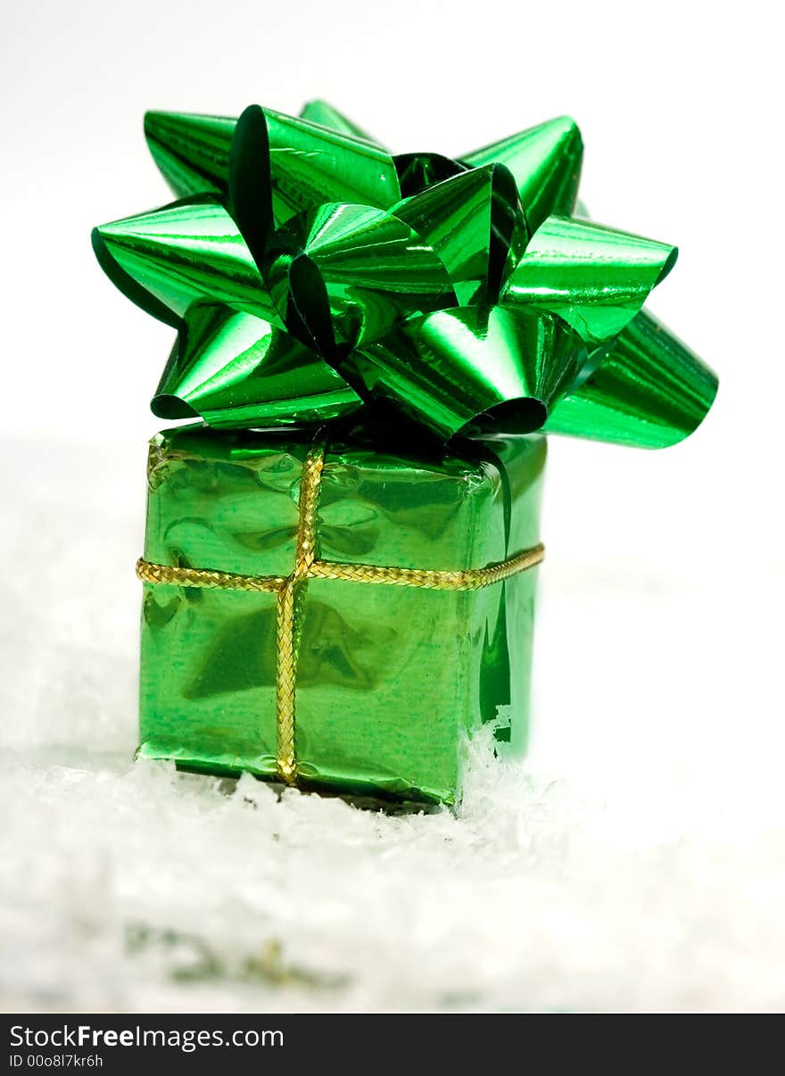 Green Gift Box On White Snow