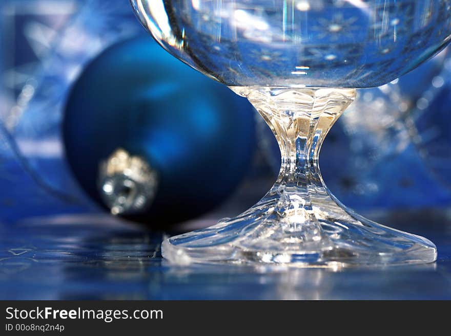 Celebration table - blue Christmas ball and glass