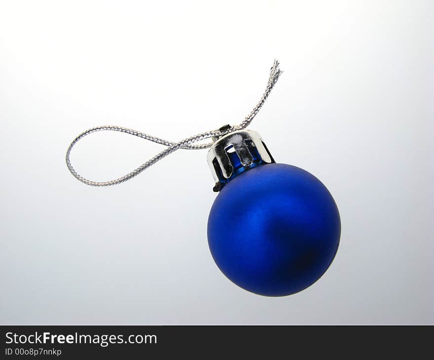 Fur-tree toy, blue sphere on  white background. Fur-tree toy, blue sphere on  white background