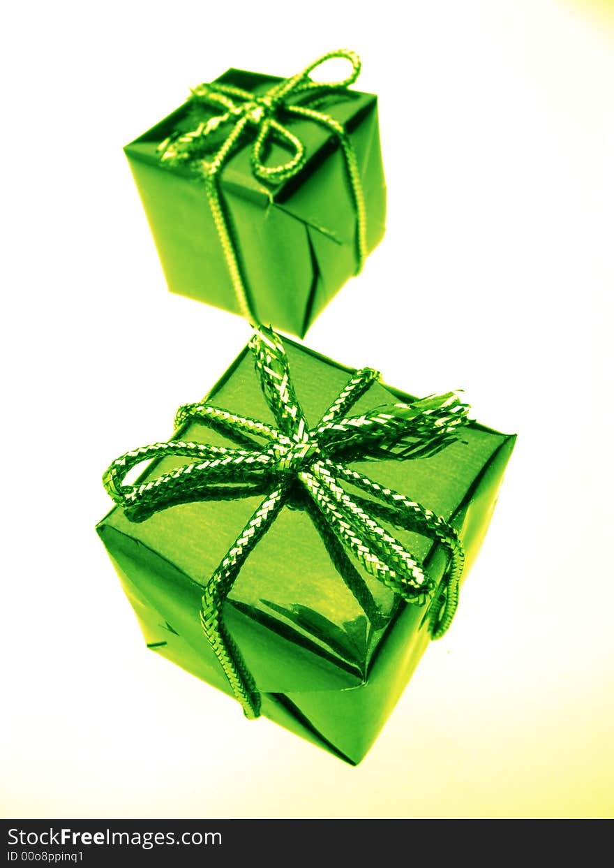 Usual gift boxes of green color on  white background. Usual gift boxes of green color on  white background