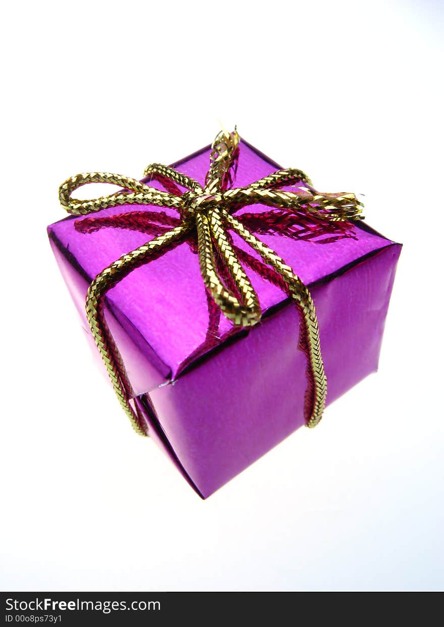 Usual gift box of violet color on  white background. Usual gift box of violet color on  white background