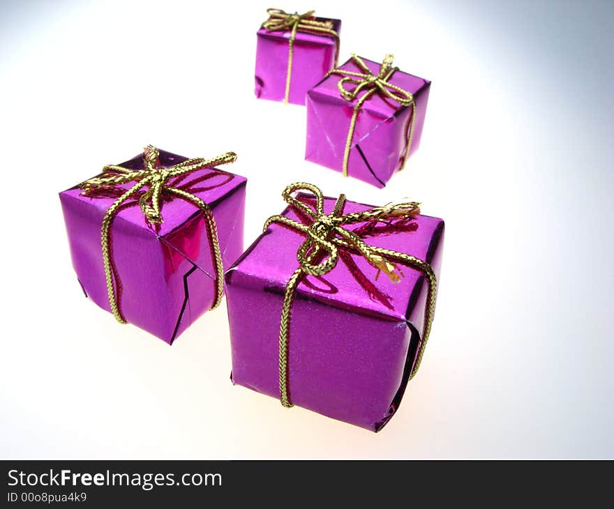 Usual gift boxes of violet color on  white background. Usual gift boxes of violet color on  white background