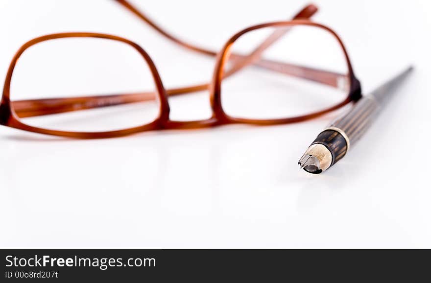 Glasses and pen.