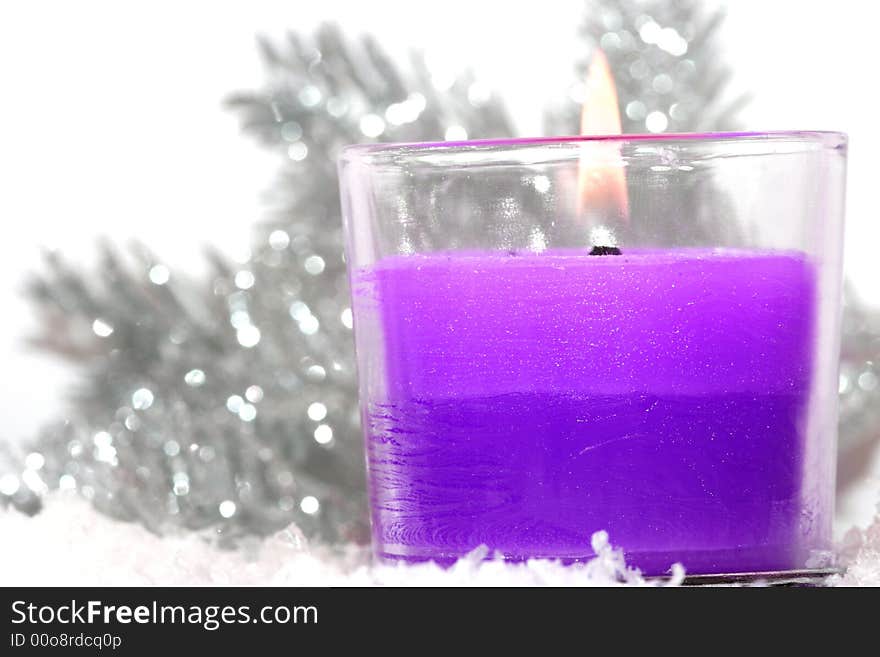 Festive new-year candle with snow