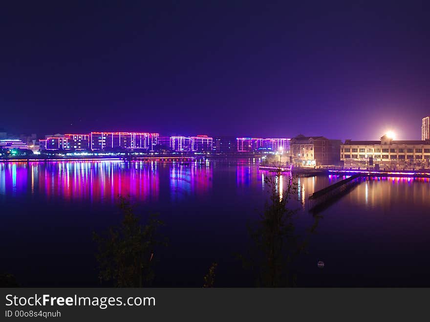 It's my hometown-JinTang,which is a beaytiful town in Sichuan,China. Many lights made inverted reflection in water。What a charming night!. It's my hometown-JinTang,which is a beaytiful town in Sichuan,China. Many lights made inverted reflection in water。What a charming night!