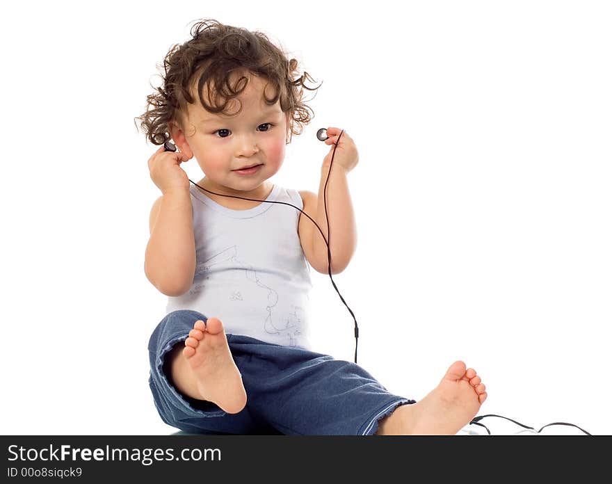 Child with headphones,isolated on a white background. Child with headphones,isolated on a white background.