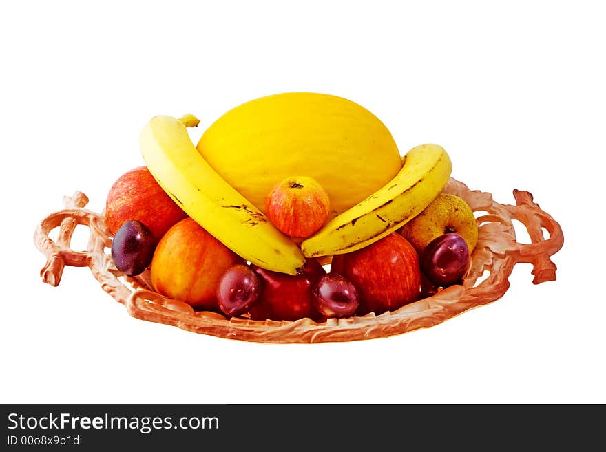 Bowl of fresh fruit, isolated on a white background with clipping path. Bowl of fresh fruit, isolated on a white background with clipping path.