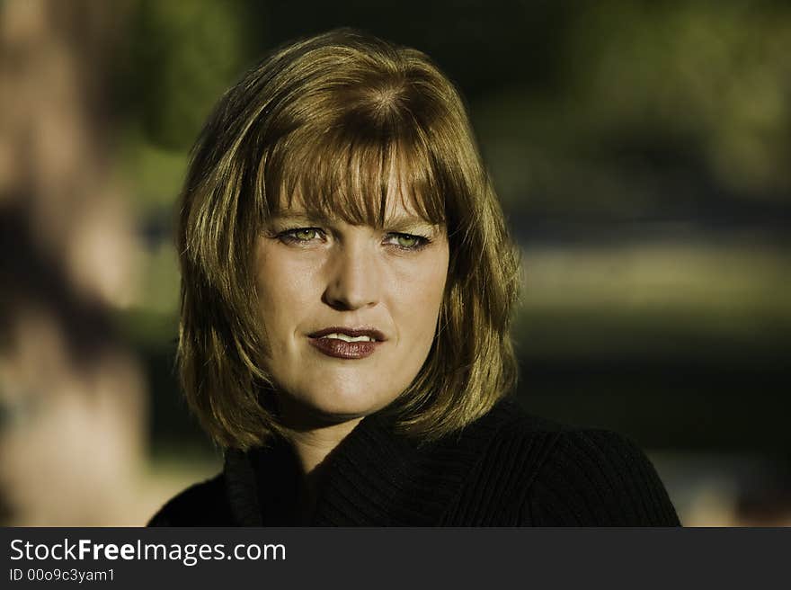 Blonde woman model with green eyes and a neutral expression. Blonde woman model with green eyes and a neutral expression