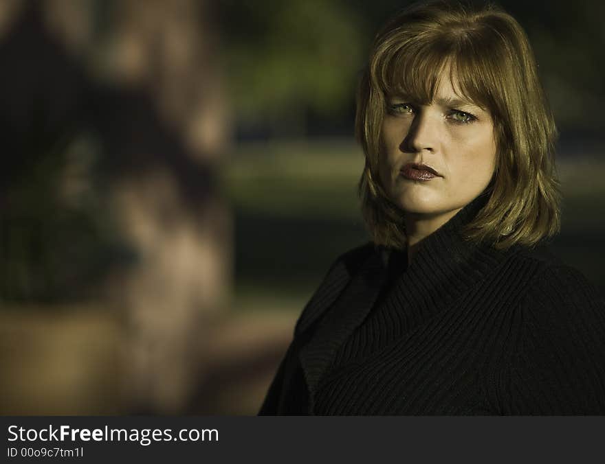 Blonde woman model with green eyes and a neutral expression. Blonde woman model with green eyes and a neutral expression