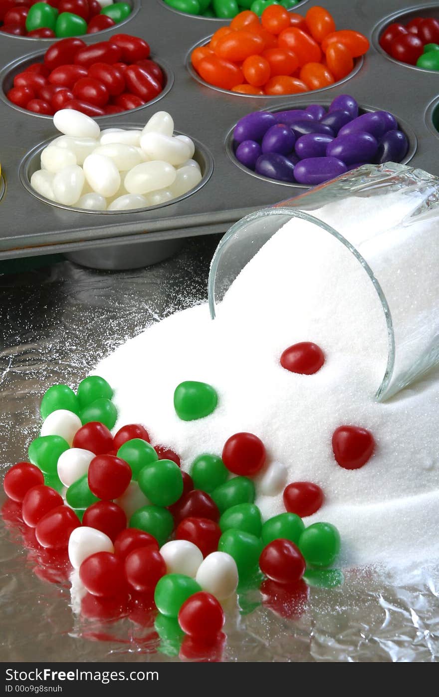 Christmas candy with a bowl of spilled sugar. Christmas candy with a bowl of spilled sugar.