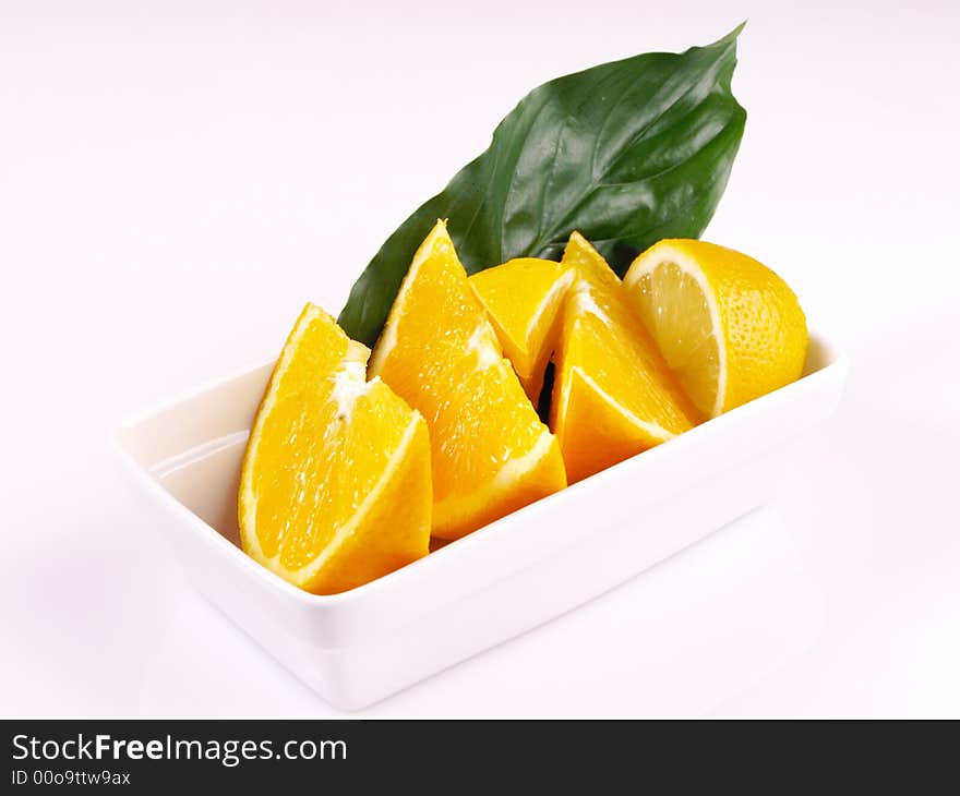 Juicy oranges, lemon and green leaf. Juicy oranges, lemon and green leaf