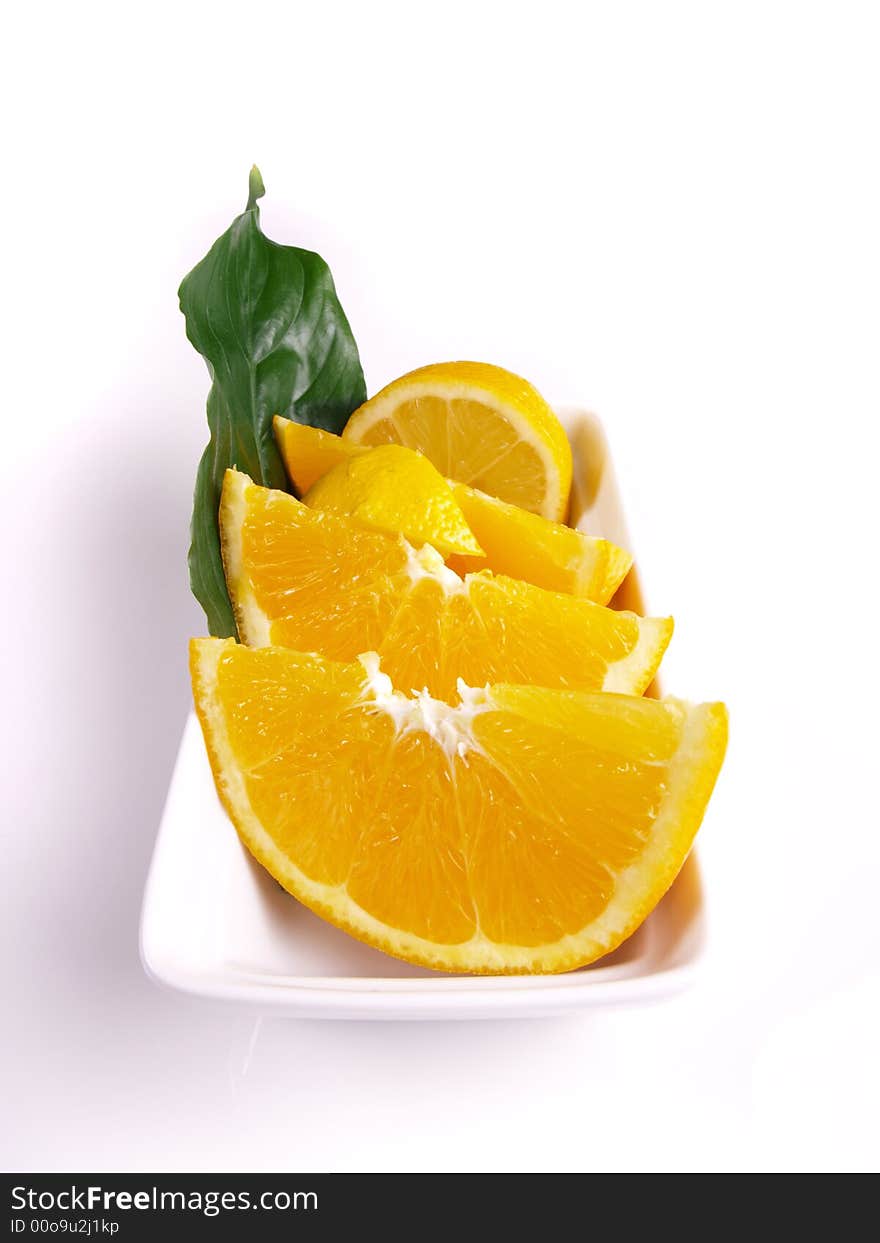 Oranges, lemon, leaf