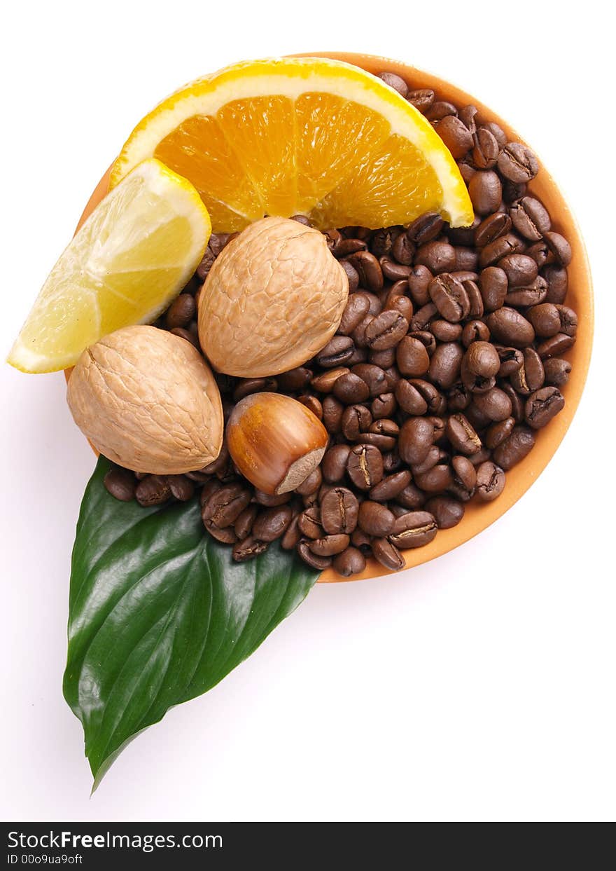 Coffee beans, juicy oranges,  nut and lemon. Coffee beans, juicy oranges,  nut and lemon