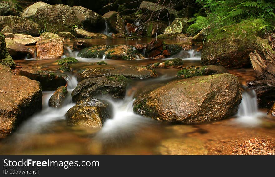 Autumn on stream in czech mountains