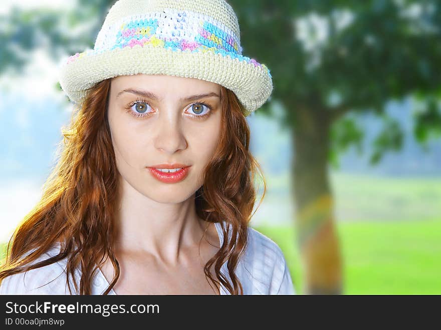 Portrait of nice redhead girl in summer environment. Portrait of nice redhead girl in summer environment