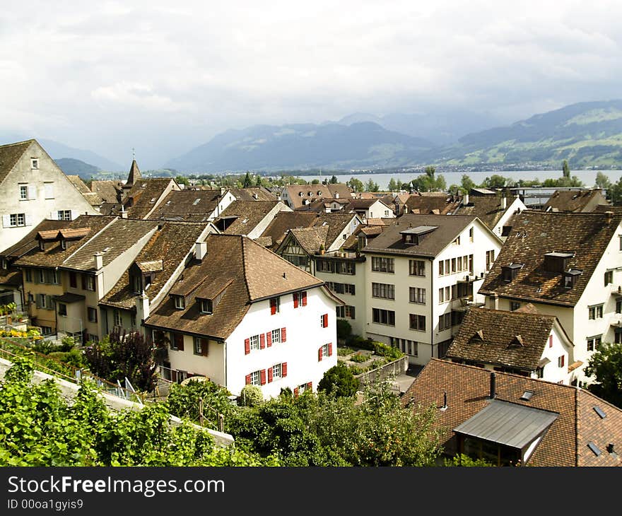 Rapperswil brown roofs in background zurich lake.