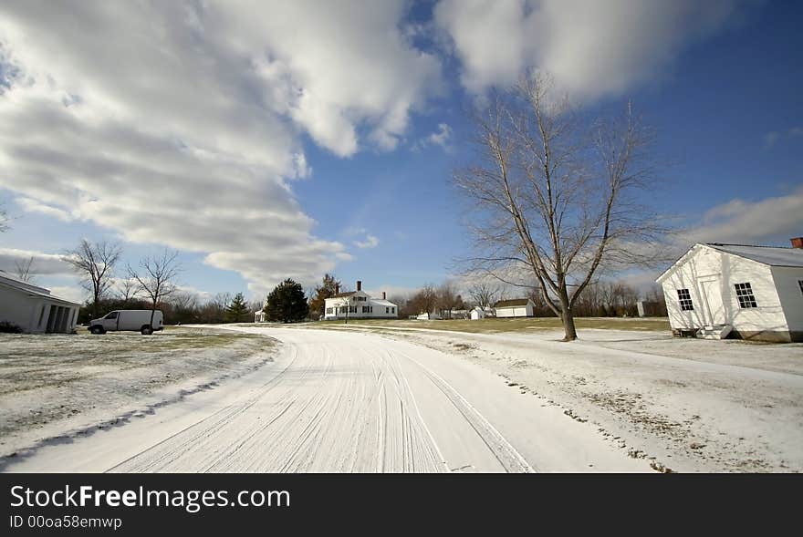 Snow covered country road during winter season. Snow covered country road during winter season