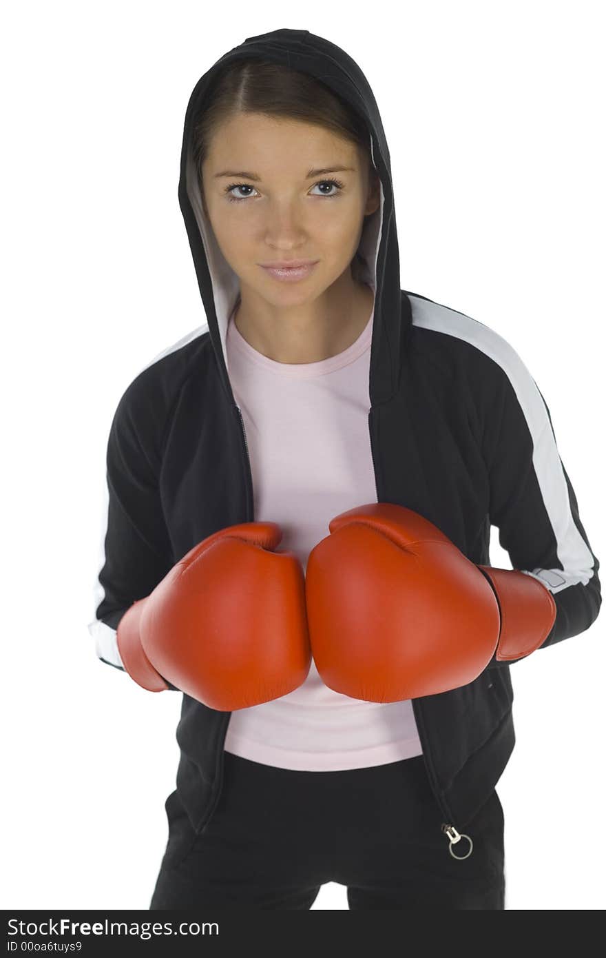 Young, hooded beauty with boxing gloves. Smiling and looking at something. White background, front view. Young, hooded beauty with boxing gloves. Smiling and looking at something. White background, front view