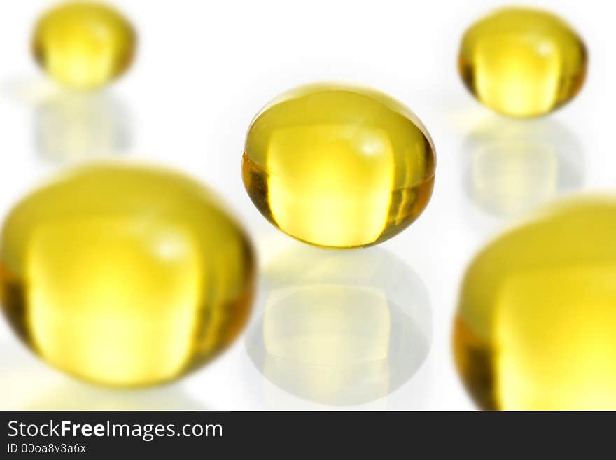 Close-up of  pills on a white background