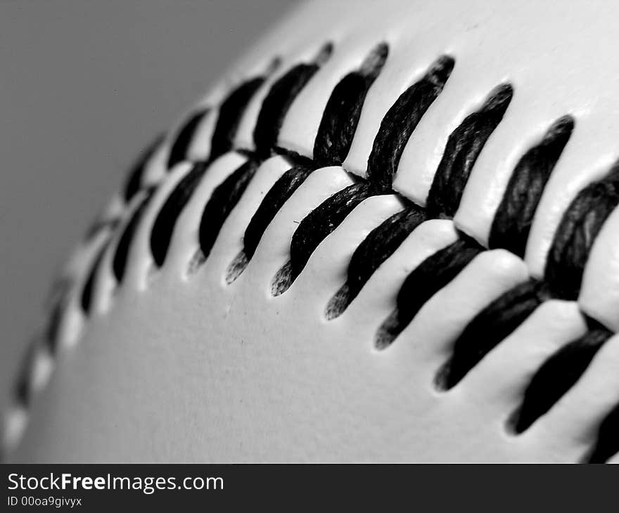 Seam of a white baseball ball.