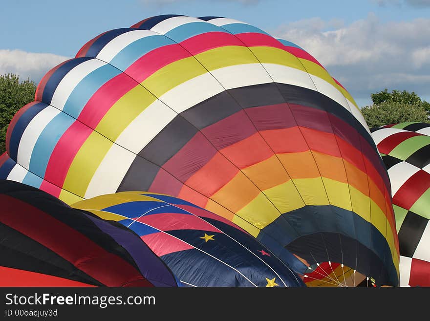 Hot Air Balloons being inflated before lift off