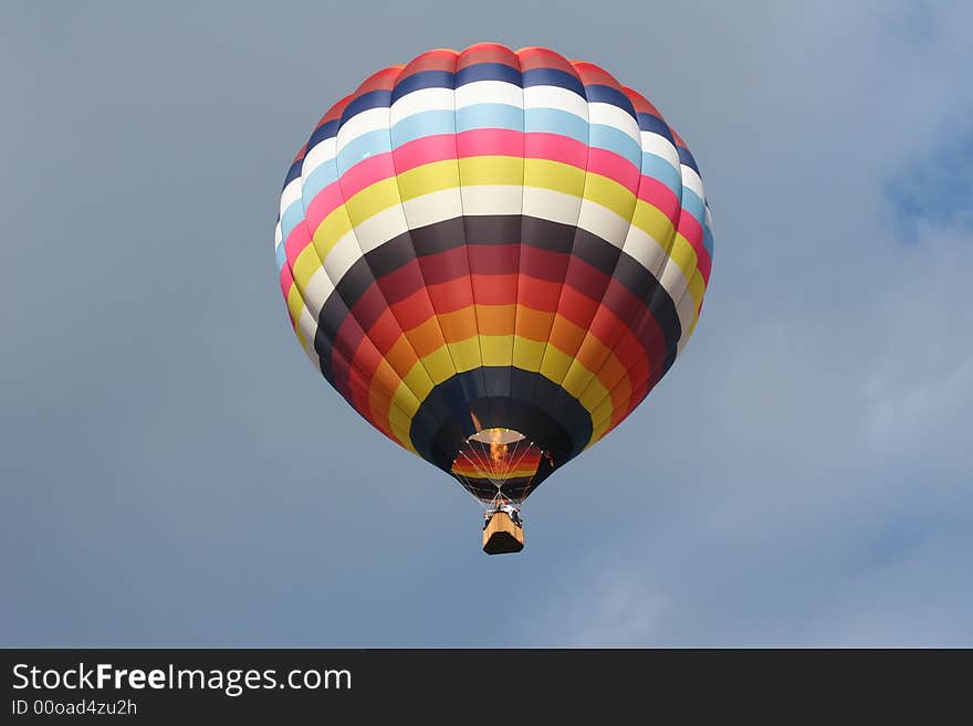 Looking up into a hot air balloon with the flame ignited