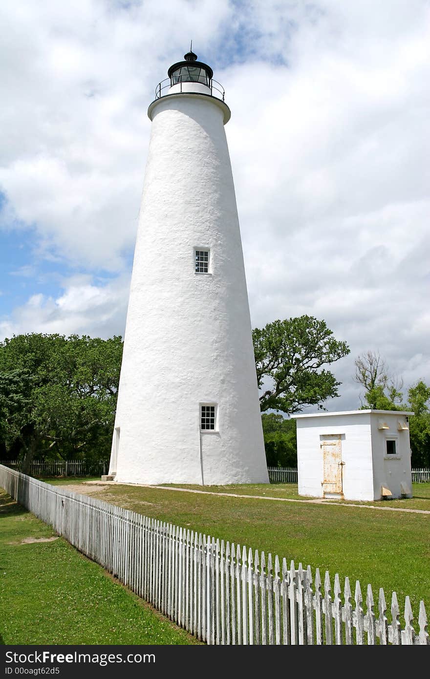 Ocracoke Island Lighthouse with small white building