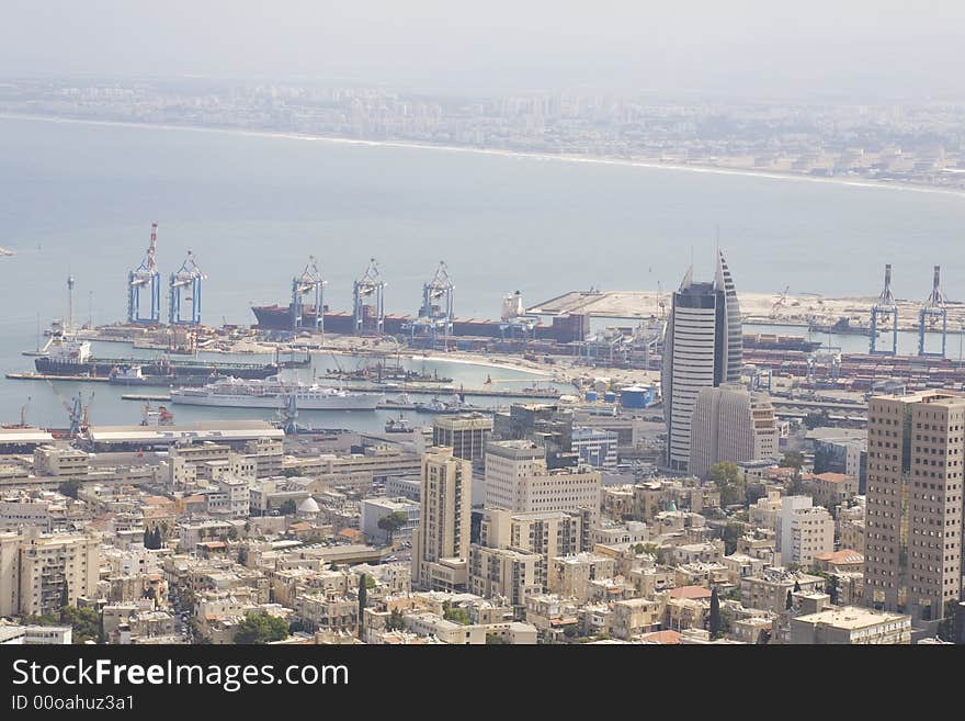 View of Sail Tower and downtown Haifa with shipping docks