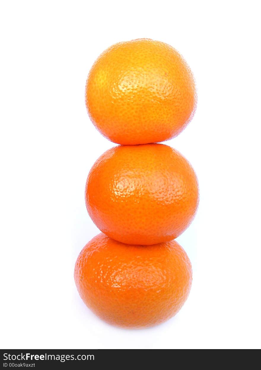 Pyramid from mandarine on white background. Pyramid from mandarine on white background