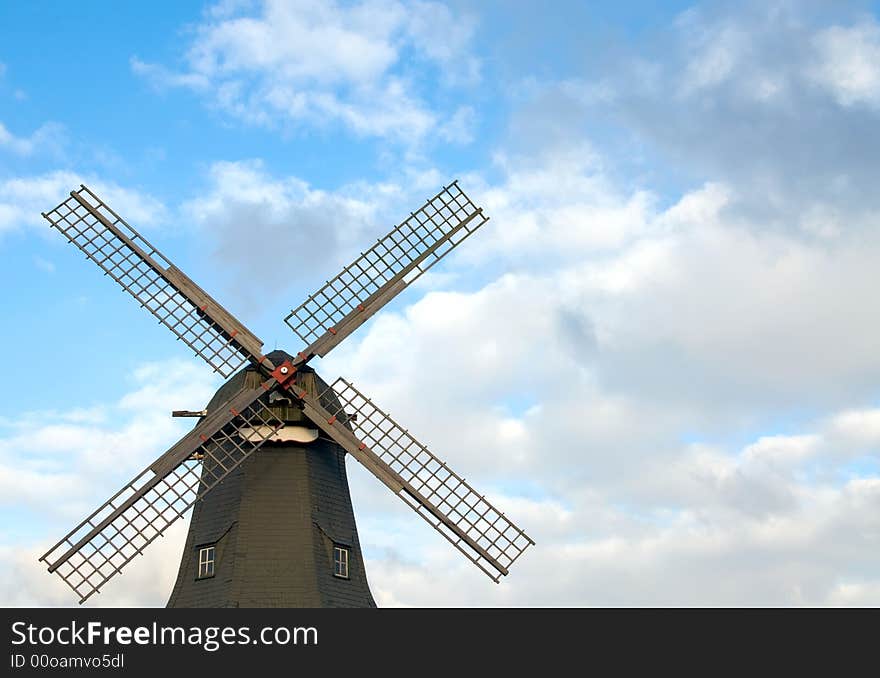 Old Windmill Against Blue Sky